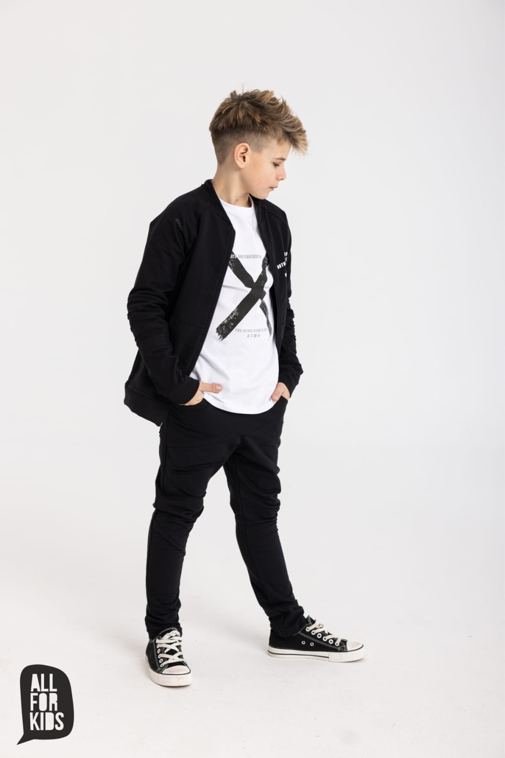 czarne dzianinowe spodnie z rozcięciam all for kids