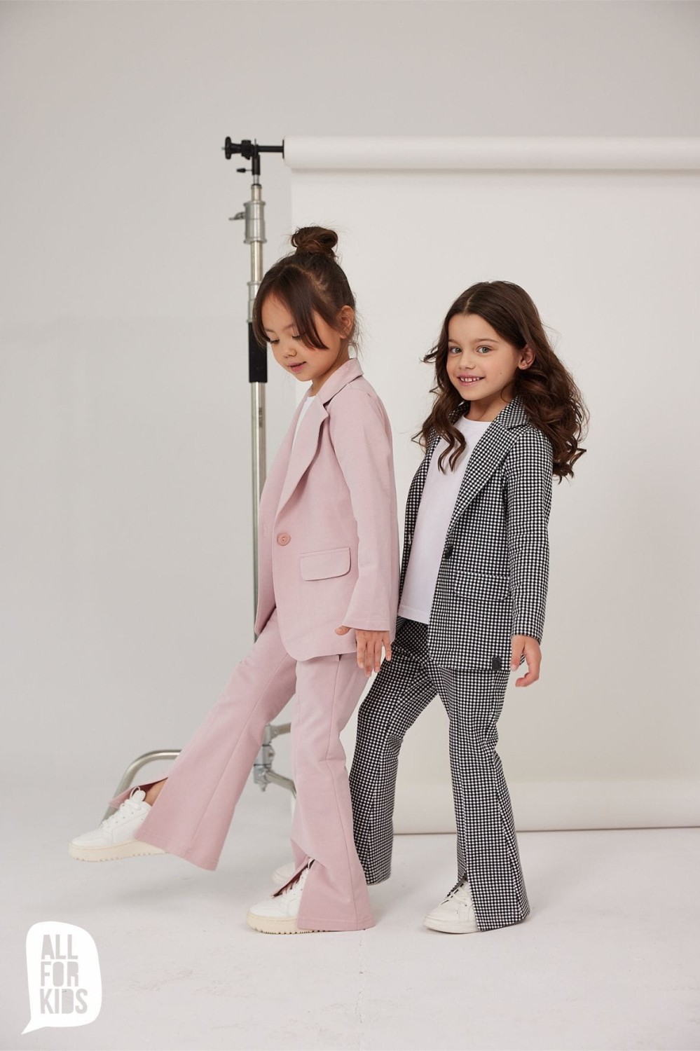 Spodnie dzwony z rozcięciem różowe All For Kids