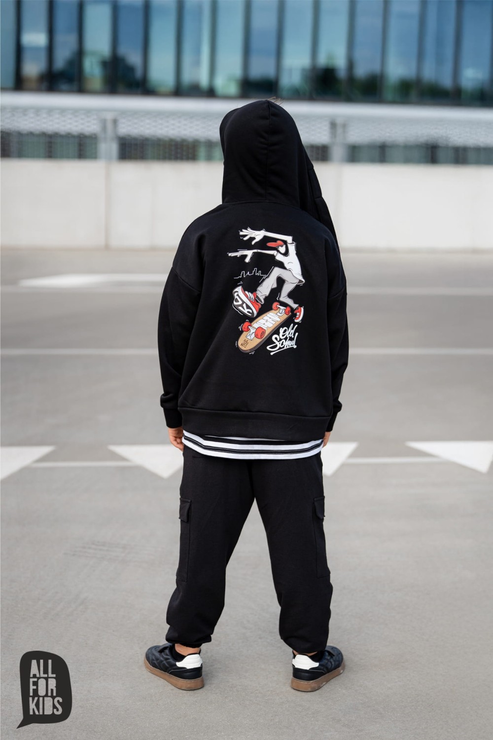 szerokie spodnie z kieszeniami i gumką na dole czarne all for kids