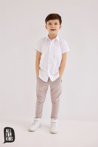 Beżowe spodnie casual All For Kids   